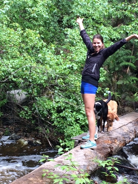 girl balancing on a log image