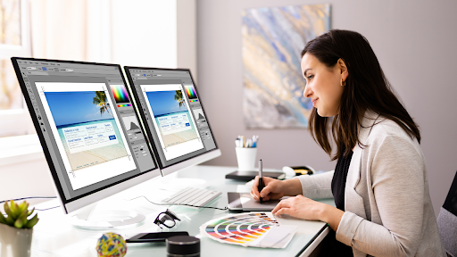 web design psychology lady designing a new website two developer monitors