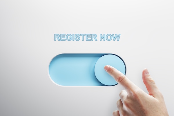 A close up shot shows a finger gently nudging a light blue toggle switch that reads "Register Now" against a clean white background.